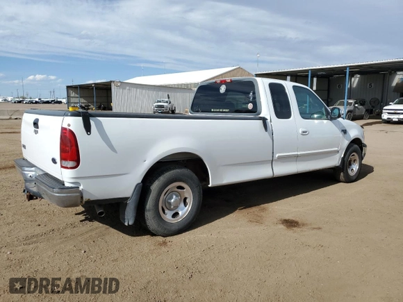 1999 Ford F-150 with VIN 2FTRX17L0XCA37979, listed as a Copart auction lot 58216695 with 256,055 mi miles and Clean title. Bid and sale history available at DreamBid. Image 3.