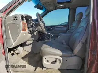 2003 GMC Envoy SLT with VIN 1GKDT13S732378731, listed as a Copart auction lot 88340825 with 125,814 mi miles and Salvage Title. Bid and sale history available at carsss.com. Image 7.