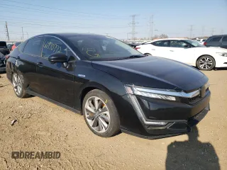 2018 Honda Clarity Touring with VIN JHMZC5F39JC019173, listed as a Copart auction lot 66970772 with 28,674 mi miles. Bid and sale history available at carsss.com. Image 1.