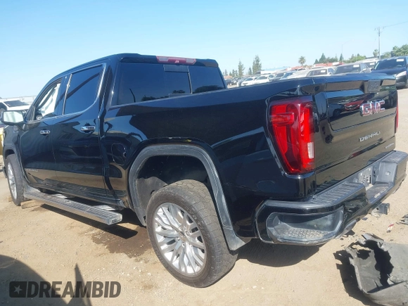 2019 GMC Sierra 1500 Denali z VIN 1GTU9FEL8KZ173809, wystawiony jako IAAI lot #42363300 z przebiegiem 75 425 mil mil oraz . Historia ofert i sprzedaży dostępna na DreamBid. Obrazek 3.