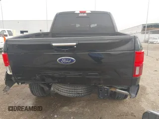 2020 Ford F-150 XL with VIN 1FTEW1E56LKE34768, listed as a IAAI auction lot 41807705 with 83,898 mi miles and . Bid and sale history available at DreamBid. Image 6.