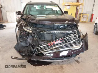 2021 GMC Acadia Denali with VIN 1GKKNXLS2MZ140119, listed as a IAAI auction lot 42553557 with 50,197 mi miles and . Bid and sale history available at DreamBid. Image 6.