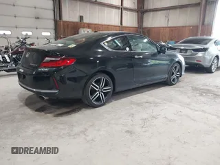2016 Honda Accord Touring with VIN 1HGCT2B05GA002832, listed as a IAAI auction lot 42221520 with 217,435 mi miles and . Bid and sale history available at DreamBid. Image 4.