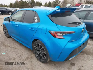 2019 Toyota Corolla Hatchback SE with VIN JTNK4RBEXK3033062, listed as a IAAI auction lot 41471618 with 195,001 mi miles. Bid and sale history available at carsss.com. Image 3.