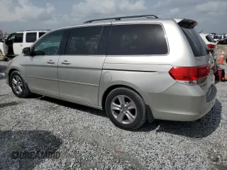 2008 Honda Odyssey Touring z VIN 5FNRL38978B062320, wystawiony jako Copart lot #59898345 z przebiegiem 229 760 mil mil oraz Czysty tytuł • Clean title. Historia ofert i sprzedaży dostępna na DreamBid. Obrazek 2.