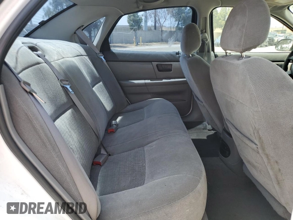 2006 Ford Taurus SE with VIN 1FAFP53U96A104173, listed as a Copart auction lot 59624865 with 145,005 mi miles and Salvage title. Bid and sale history available at DreamBid. Image 10.