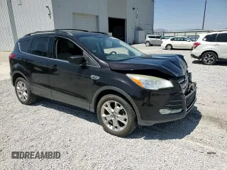 2013 Ford Escape SE с VIN 1FMCU9G91DUC25077, выставлен на аукционе Copart как лот 60888305 с пробегом 212 409 миль миль и Списание • Salvage title. История ставок и продаж доступна на DreamBid. Изображение 13.