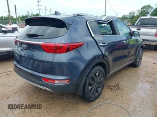 2019 Kia Sportage EX with VIN KNDPN3AC3K7569882, listed as a IAAI auction lot 42094311 with 67,816 mi miles and . Bid and sale history available at DreamBid. Image 4.