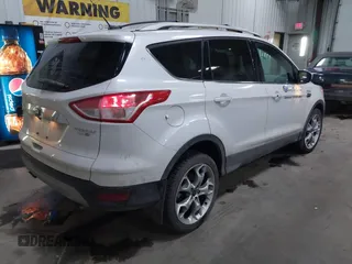 2016 Ford Escape Titanium with VIN 1FMCU9J94GUC79910, listed as a IAAI auction lot 41644467 with 43,261 mi miles. Bid and sale history available at carsss.com. Image 4.