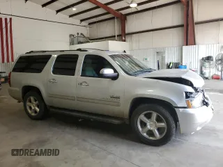 2014 Chevrolet Suburban LT with VIN 1GNSCJE07ER140989, listed as a Copart auction lot 44506315 with 162,490 mi miles and Salvage Title. Bid and sale history available at carsss.com. Image 4.