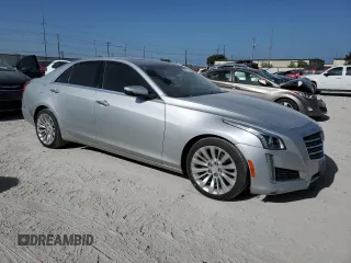 2016 Cadillac CTS Luxury Collection AWD with VIN 1G6AX5SX7G0103193, listed as a Copart auction lot 61808174 with 104,129 mi miles and Clean Title. Bid and sale history available at DreamBid. Image 4.