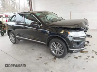 2015 Volkswagen Touareg Sport с VIN WVGEP9BP9FD003055, выставлен на аукционе IAAI как лот 41845013 с пробегом 55 891 миль миль и . История ставок и продаж доступна на DreamBid. Изображение 1.