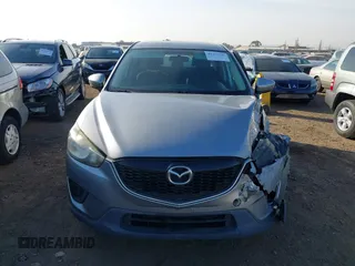 2014 Mazda CX-5 Sport with VIN JM3KE2BE9E0330345, listed as a IAAI auction lot 41377335 with 103,340 mi miles and . Bid and sale history available at carsss.com. Image 12.