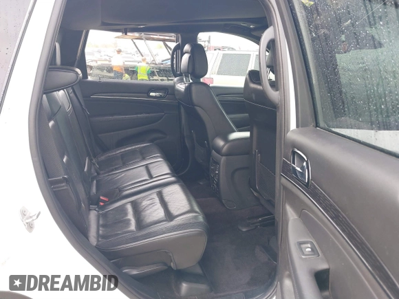 2019 Jeep Grand Cherokee High Altitude with VIN 1C4RJFCTXKC595552, listed as a IAAI auction lot 41877039 with 102,394 mi miles and . Bid and sale history available at DreamBid. Image 8.