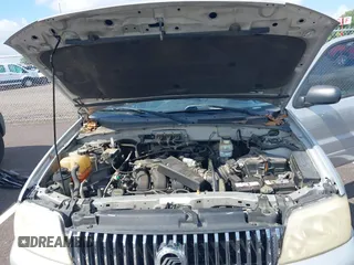 2006 Mercury Mariner Luxury with VIN 4M2YU56106KJ11501, listed as a IAAI auction lot 42634351 with 141,456 mi miles and . Bid and sale history available at DreamBid. Image 10.