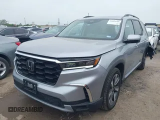 2023 Honda Pilot Touring with VIN 5FNYG2H75PB014662, listed as a IAAI auction lot 41889246 with 14,413 mi miles. Bid and sale history available at carsss.com. Image 2.