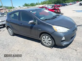 2012 Toyota Prius One z VIN JTDKDTB38C1013132, wystawiony jako IAAI lot #42345947 z przebiegiem 257 153 mil mil oraz . Historia ofert i sprzedaży dostępna na DreamBid. Obrazek 1.