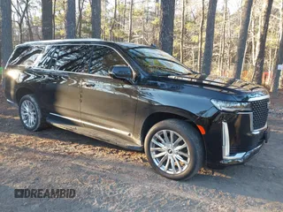 2021 Cadillac Escalade ESV Premium Luxury z VIN 1GYS4KKL9MR477201, wystawiony jako IAAI lot #41230638 z przebiegiem 100 697 mil mil oraz . Historia ofert i sprzedaży dostępna na DreamBid. Obrazek 1.