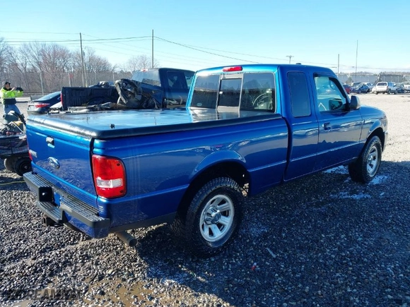 2011 Ford Ranger XLT with VIN 1FTKR4EE3BPB03532, listed as a IAAI auction lot 41723661 with 219195 miles. Bid and sale history available at carsss.com. Image 4.