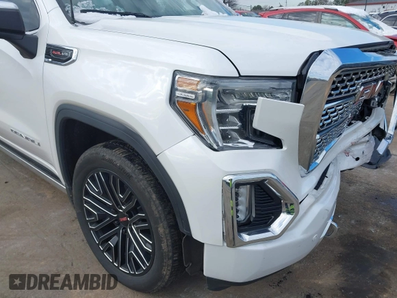 2020 GMC Sierra 1500 Denali z VIN 3GTU9FELXLG371258, wystawiony jako IAAI lot #41303490 z przebiegiem 63 571 mil mil oraz . Historia ofert i sprzedaży dostępna na DreamBid. Obrazek 17.