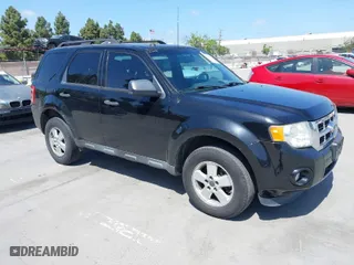 2012 Ford Escape XLT with VIN 1FMCU0D71CKC10734, listed as a IAAI auction lot 42065049 with 207,698 mi miles. Bid and sale history available at carsss.com. Image 1.