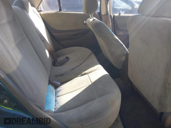 2000 Mazda Protege DX with VIN JM1BJ2229Y0235881, listed as a IAAI auction lot 41484779 with 283,054 mi miles and . Bid and sale history available at DreamBid. Image 8.