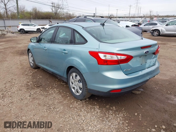 2012 Ford Focus SE with VIN 1FAHP3F24CL336350, listed as a IAAI auction lot 41882948 with 153,238 mi miles. Bid and sale history available at carsss.com. Image 3.