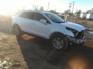 2021 Cadillac XT5 AWD Premium Luxury with VIN 1GYKNDRS2MZ142755, listed as a IAAI auction lot 41300895 with 37,107 mi miles. Bid and sale history available at carsss.com. Image 1.