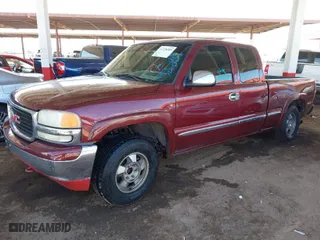 2002 GMC Sierra 1500 SLE with VIN 2GTEC19V821114370, listed as a IAAI auction lot 41728399 with 254,162 mi miles. Bid and sale history available at carsss.com. Image 2.