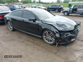 2018 Audi A7 Premium Plus z VIN WAUW3AFC4JN086553, wystawiony jako IAAI lot #42103883 z przebiegiem 87 108 mil mil oraz . Historia ofert i sprzedaży dostępna na DreamBid. Obrazek 1.