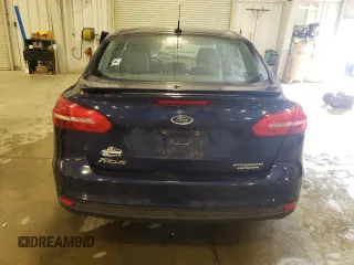 2016 Ford Focus Titanium z VIN 1FADP3J27GL310367, wystawiony jako Copart lot #55048005 z przebiegiem 86 676 mil mil oraz Szkoda całkowita • Salvage title. Historia ofert i sprzedaży dostępna na DreamBid. Obrazek 6.