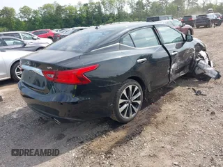 2016 Nissan Maxima Platinum z VIN 1N4AA6AP8GC901079, wystawiony jako IAAI lot #42423396 z przebiegiem 100 750 mil mil oraz . Historia ofert i sprzedaży dostępna na DreamBid. Obrazek 4.