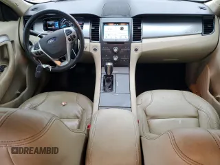 2016 Ford Taurus SEL with VIN 1FAHP2E9XGG144955, listed as a Copart auction lot 82207634 with 128,823 mi miles and Salvage Title. Bid and sale history available at DreamBid. Image 8.
