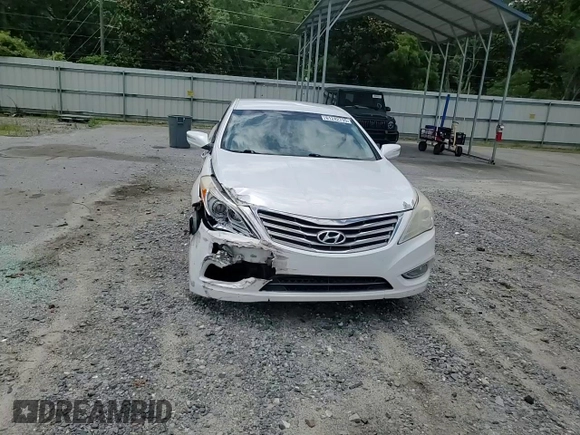 2014 Hyundai Azera with VIN KMHFG4JG3EA348610, listed as a Copart auction lot 61242735 with 190,846 mi miles and Salvage title. Bid and sale history available at DreamBid. Image 13.