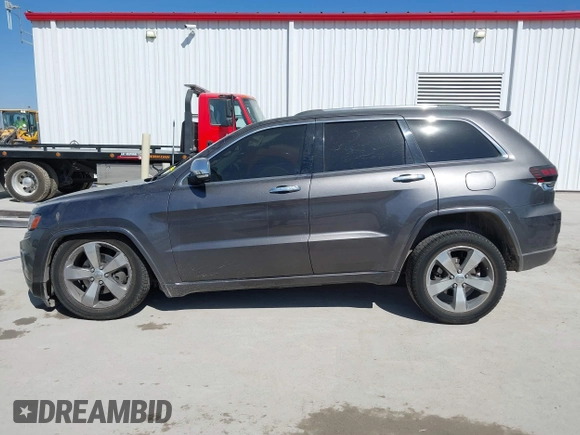 2015 Jeep Grand Cherokee Overland with VIN 1C4RJECT2FC648292, listed as a IAAI auction lot 41806402 with 116,766 mi miles. Bid and sale history available at carsss.com. Image 15.
