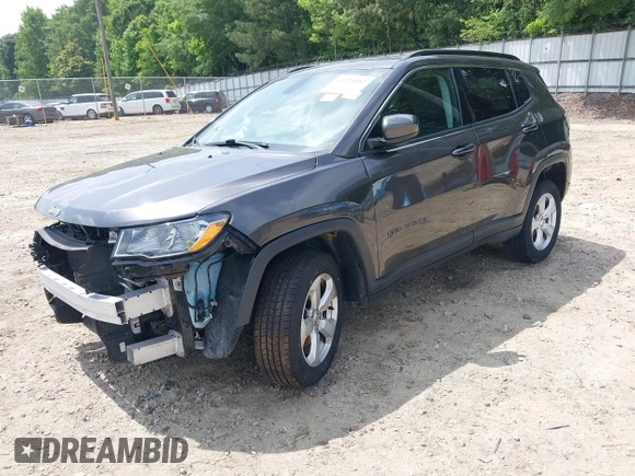 2019 Jeep Compass Latitude with VIN 3C4NJDBB8KT748588, listed as a IAAI auction lot 42224482 with 70,810 mi miles and . Bid and sale history available at DreamBid. Image 2.