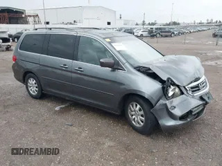 2010 Honda Odyssey EX-L with VIN 5FNRL3H78AB113568, listed as a IAAI auction lot 41181639 with 132,130 mi miles. Bid and sale history available at carsss.com. Image 1.