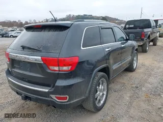 2013 Jeep Grand Cherokee Limited with VIN 1C4RJFBG1DC618482, listed as a IAAI auction lot 40707340 with 108,102 mi miles. Bid and sale history available at carsss.com. Image 4.