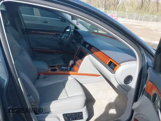 2006 Volkswagen Phaeton z VIN WVWAF03D168000214, wystawiony jako IAAI lot #41935384 z przebiegiem 80 641 mil mil oraz . Historia ofert i sprzedaży dostępna na DreamBid. Obrazek 5.