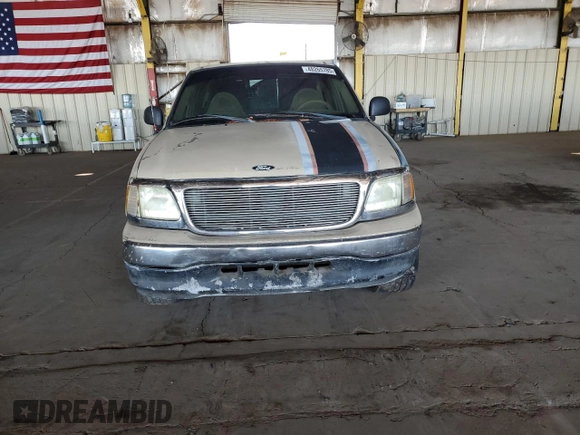 1999 Ford F-150 with VIN 1FTZX172XXKA26359, listed as a Copart auction lot 52215805 with 268,403 mi miles and Salvage title. Bid and sale history available at DreamBid. Image 5.