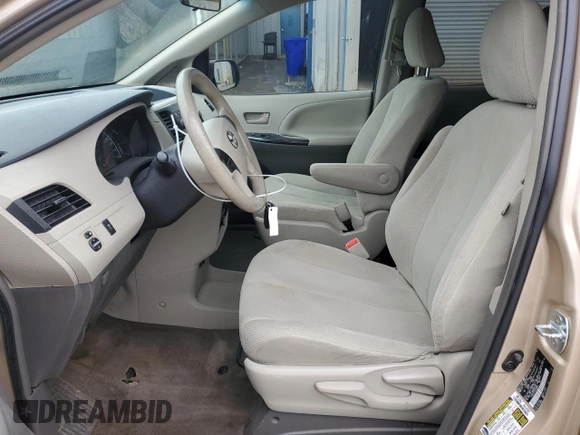 2014 Toyota Sienna L with VIN 5TDZK3DC3ES499663, listed as a Copart auction lot 57615535 with 201,561 mi miles and Salvage title. Bid and sale history available at DreamBid. Image 7.
