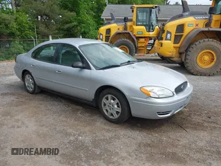 2005 Ford Taurus SE z VIN 1FAFP53U25A251787, wystawiony jako IAAI lot #42233901 z przebiegiem 141 347 mil mil oraz . Historia ofert i sprzedaży dostępna na DreamBid. Obrazek 1.