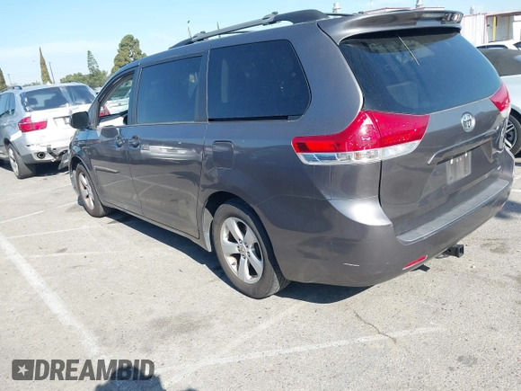 2014 Toyota Sienna LE AAS with VIN 5TDKK3DC6ES521706, listed as a IAAI auction lot 41999188 with 104,867 mi miles. Bid and sale history available at carsss.com. Image 3.