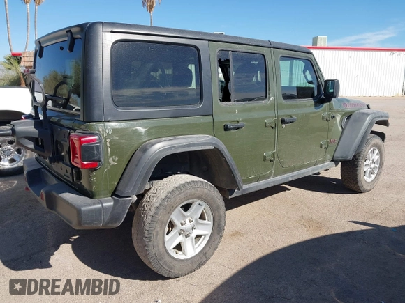 2023 Jeep Wrangler Rubicon with VIN 1C4JJXFG8PW518234, listed as a IAAI auction lot 40998757 with Not Provided miles and . Bid and sale history available at DreamBid. Image 4.