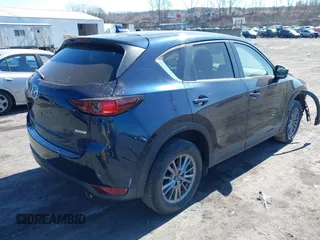 2017 Mazda CX-5 Touring with VIN JM3KFBCL8H0201074, listed as a IAAI auction lot 41747146 with 42,092 mi miles. Bid and sale history available at carsss.com. Image 4.