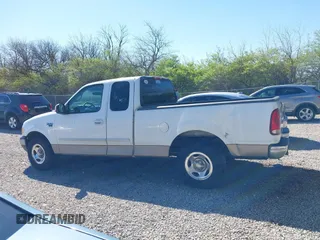 2001 Ford F-150 XL z VIN 1FTRX17L61NB26764, wystawiony jako IAAI lot #42049452 z przebiegiem 242 585 mil mil oraz . Historia ofert i sprzedaży dostępna na DreamBid. Obrazek 15.