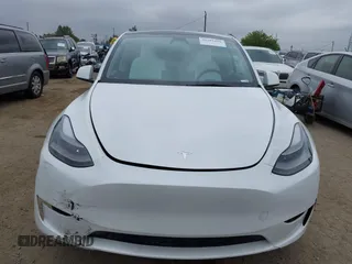 2024 Tesla Model Y with VIN 7SAYGDED4RF055859, listed as a IAAI auction lot 42201099 with 17,373 mi miles and . Bid and sale history available at DreamBid. Image 12.
