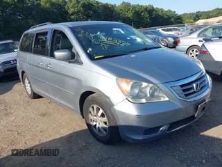 2008 Honda Odyssey EX-L with VIN 5FNRL38718B053448, listed as a IAAI auction lot 40182359 with 164,902 mi miles and . Bid and sale history available at DreamBid. Image 1.