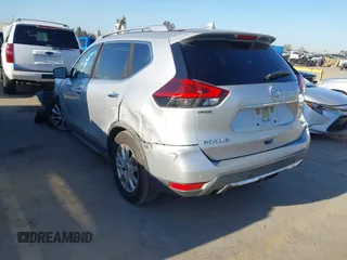 2019 Nissan Rogue SV with VIN JN8AT2MT9KW263622, listed as a IAAI auction lot 42021454 with 60,825 mi miles. Bid and sale history available at carsss.com. Image 3.