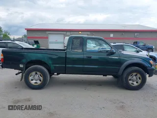 2003 Toyota Tacoma z VIN 5TEWM72N03Z296853, wystawiony jako IAAI lot #42385361 z przebiegiem 132 149 mil mil oraz . Historia ofert i sprzedaży dostępna na DreamBid. Obrazek 14.